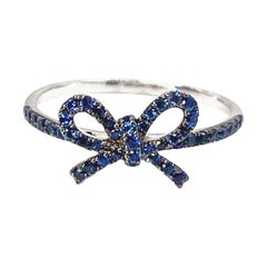 The Papillan Sapphire Bow Ring in White Gold