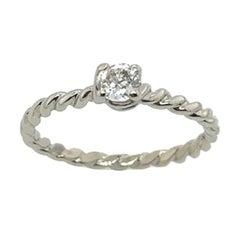 0.25ct Solitaire Diamond Twisted Pattern Ring in 9ct White Gold