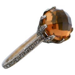 Ring aus 14 Karat Roségold mit Topas, Diamanten und Silber.