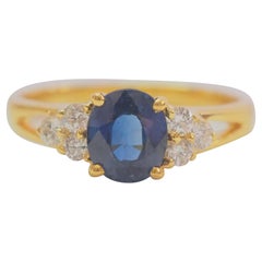 18k Gold 1.10ct Oval Blue Sapphire & 0.20ct Diamond Engagement Ring