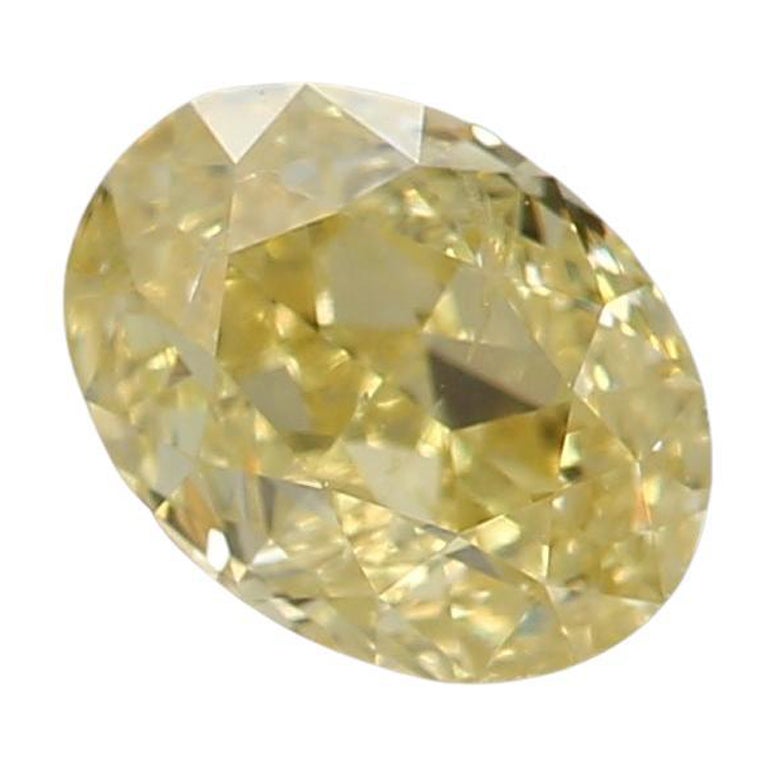 0.50 Carat Fancy Intense Yellow Oval shaped diamond I1 Clarity GIA Certified For Sale