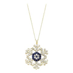 Snowflake charm necklace in 14k solid gold. Gold Snowflake Pendant.