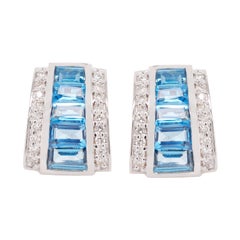 18K Gold White Blue Topaz Channel-set Baguettes Pyramid Diamond Stud Earrings