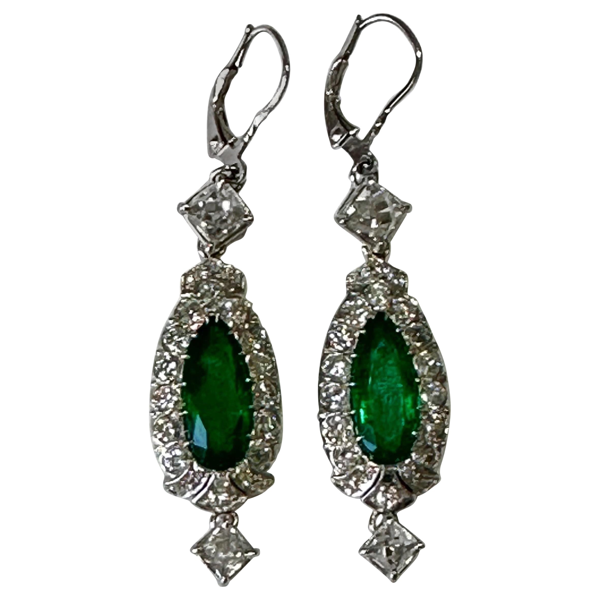 Exquisite one of a kind Mindi Mond Emerald french cut drops…
2 Pear Mixed Cut Colombian Emeralds = approx. 4.15 carats total
Origin: Colombia, Treatment: Minor oil
AGL Report: 1107349A&B

2 Top French Cut Diamonds= approx. 1.96 CTW 
2 Bottom French