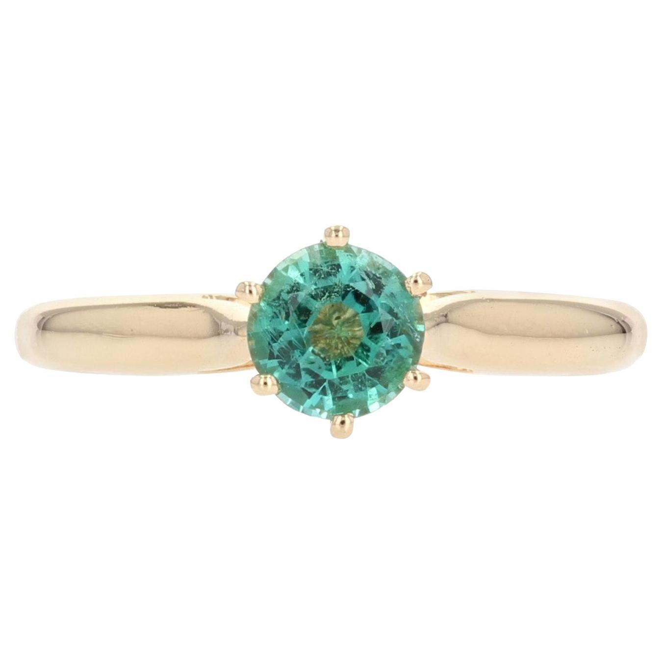 French 1960s Emerald 18 Karat Yellow Gold Solitaire Ring For Sale