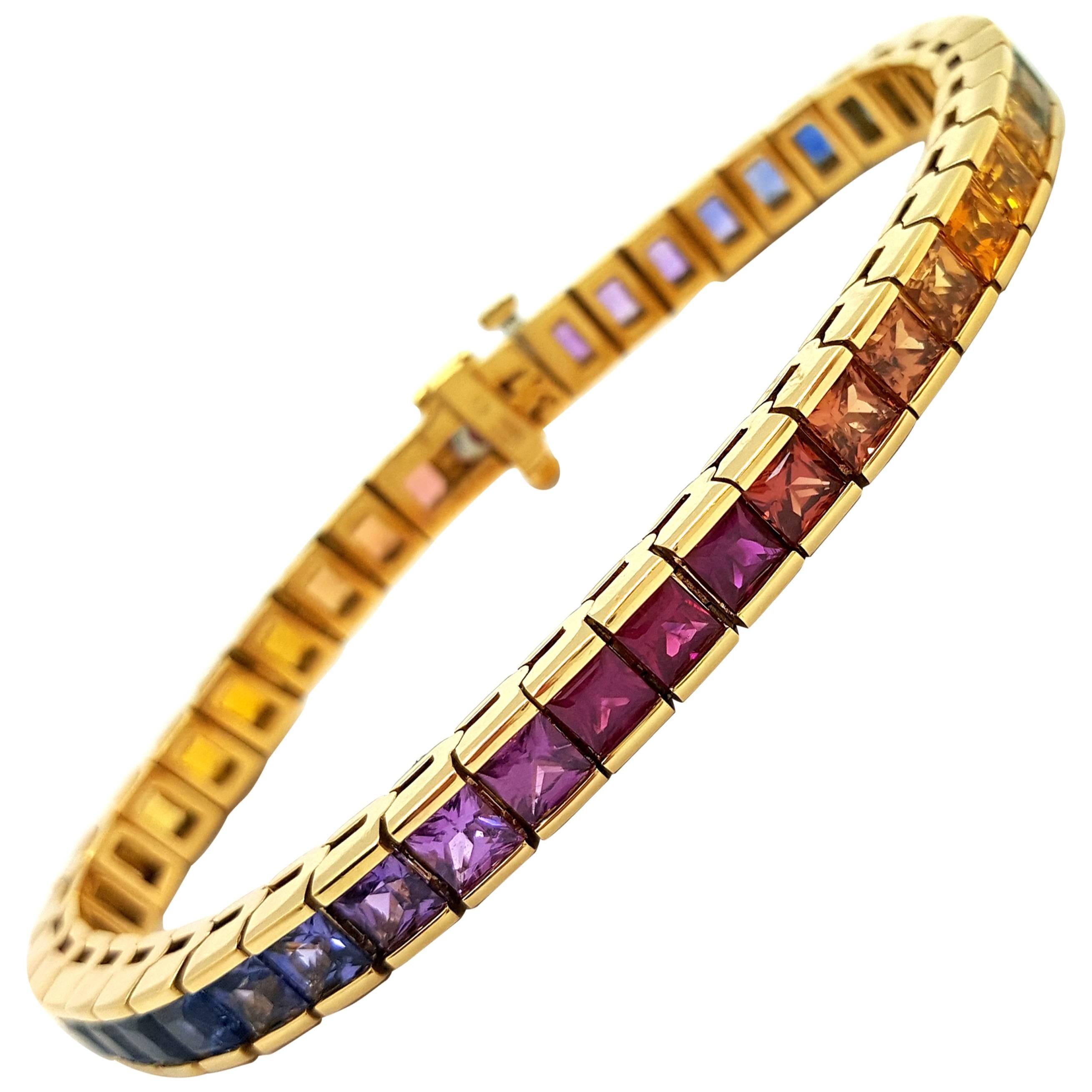 Magnificent Rainbow Sapphire Gold Tennis Bracelet For Sale