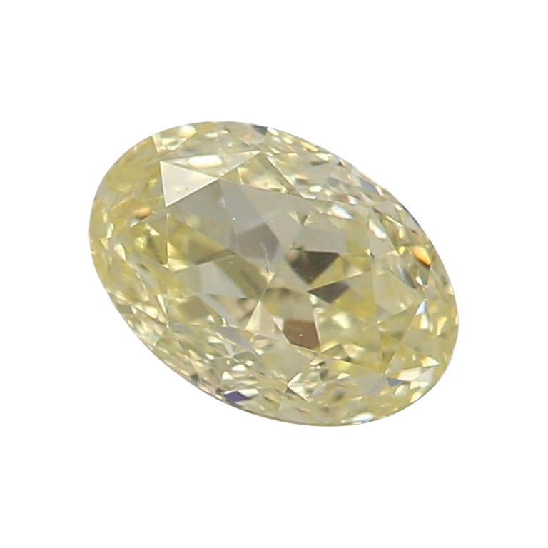 0.52 Carat Fancy Yellow Oval shaped diamond SI1 Clarity GIA Certified