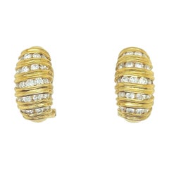 Retro Gold 1.25 Carat Natural Round Brilliant Diamond Clip Earrings Circa 1960