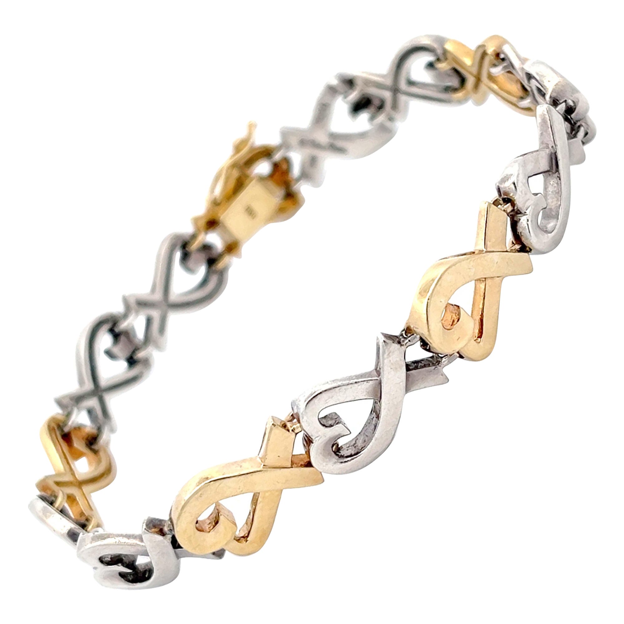 Tiffany and Co. Bracelet Loving Heart en argent sterling et or jaune 18 carats