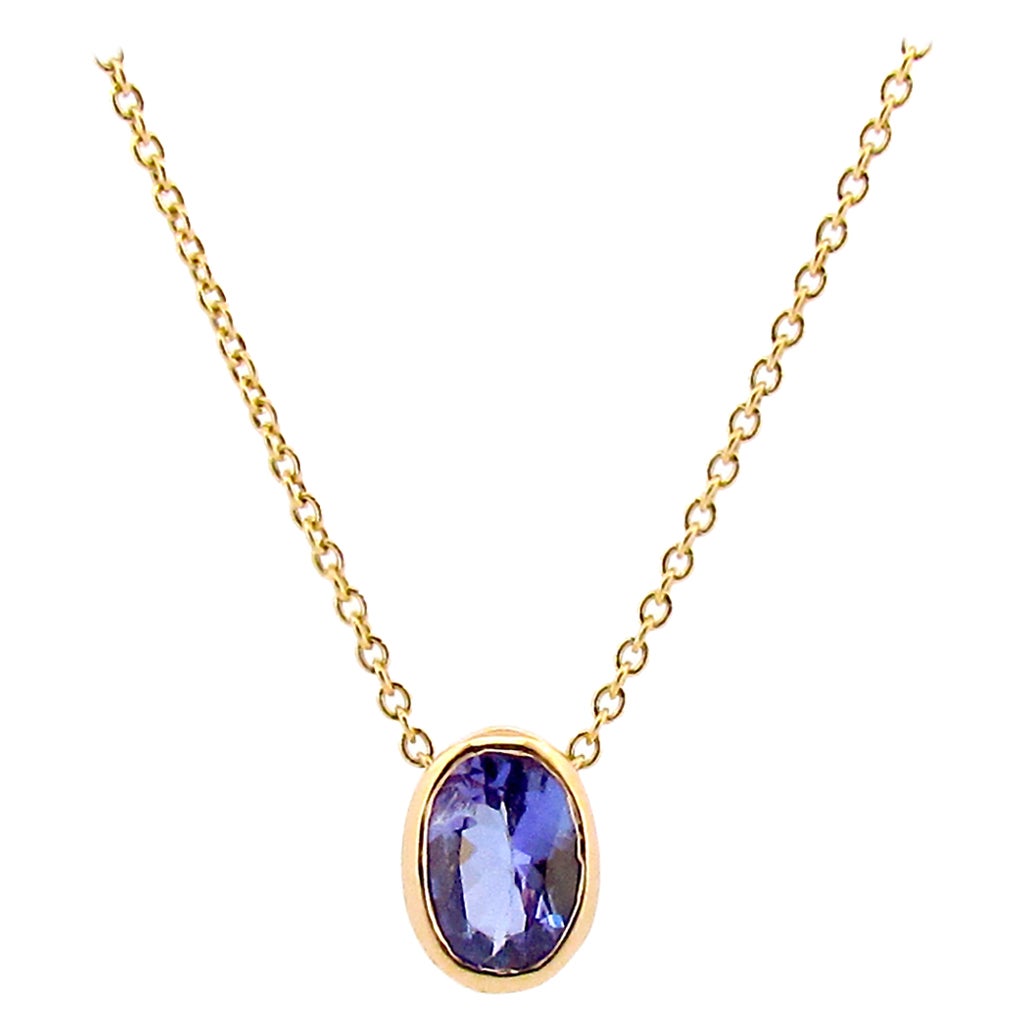 Yellow Gold Tanzanite Bezel Set Necklace   For Sale