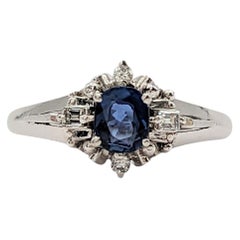 Blue Sapphire Oval and White Diamond Ring in Platinum