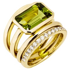 Alex Jona Anillo de oro amarillo de 18 quilates con peridoto y diamante blanco