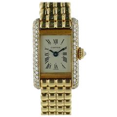 Ladies Cartier Tank Allongee Mini 18k Yellow Gold Diamond Watch on a Bracelet