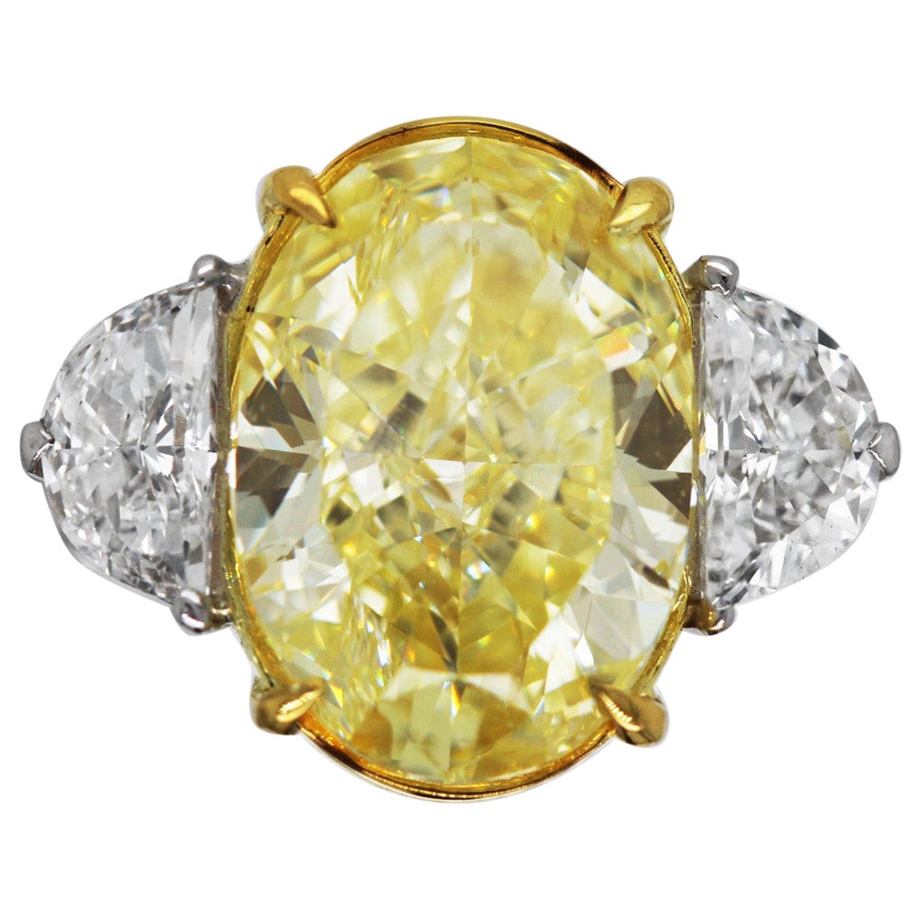 5.40 ct Natural Fancy Yellow Oval Diamond 3 Stone Engagement Ring GIA Scarselli For Sale