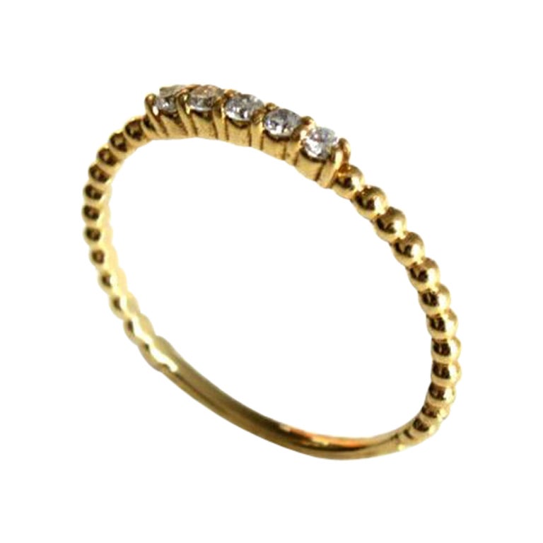 For Sale:  Cinque ring made in 14k yellow gold with 5 diamonds