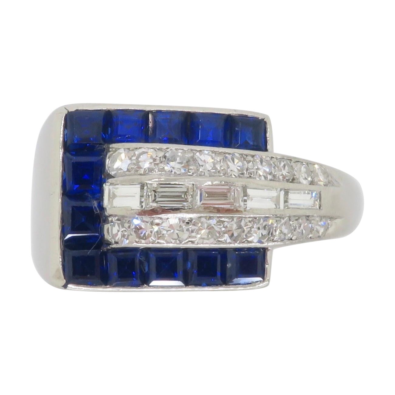 Blue Sapphire & Diamond Buckle Ring made in Platinum  For Sale