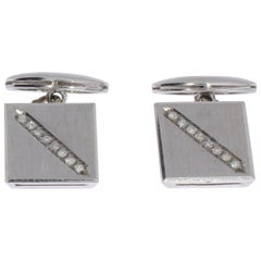 Paire de boutons de manchette en or blanc et diamants