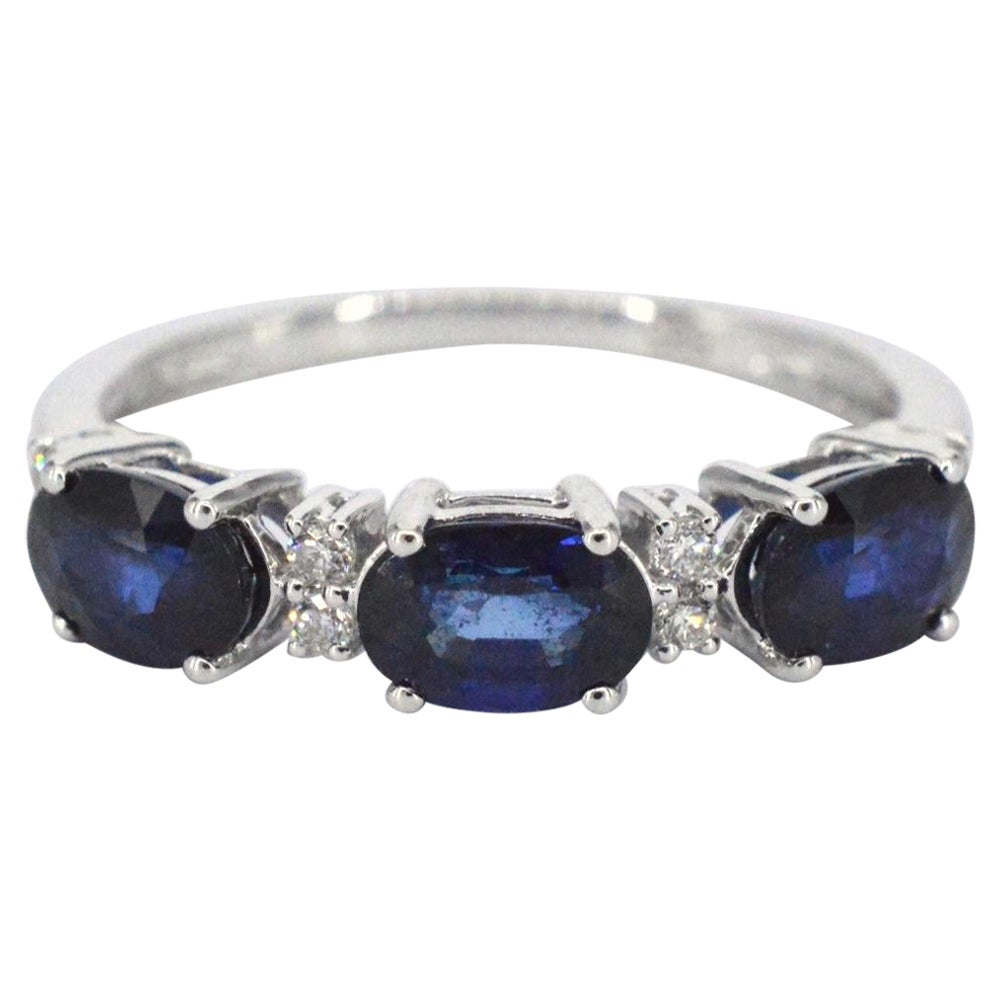 White Gold Ring with Diamonds and Sapphire For Sale