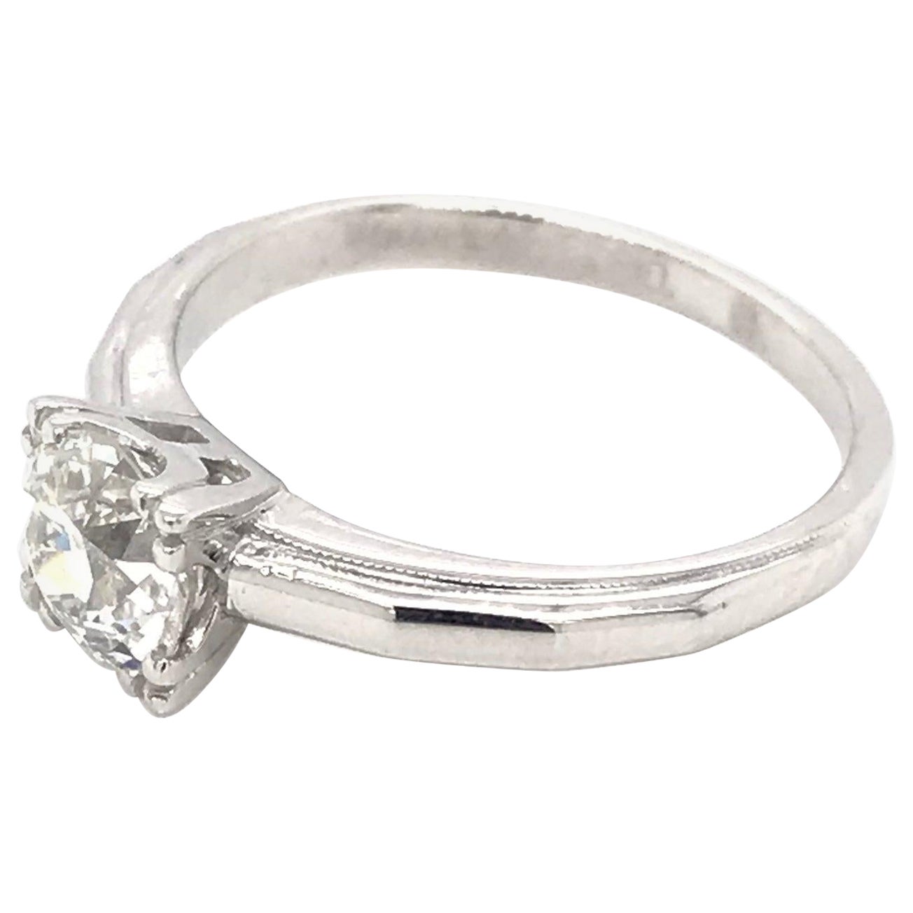 0.88 Old Mine Cut Diamond and Platinum Solitaire Style Ring For Sale