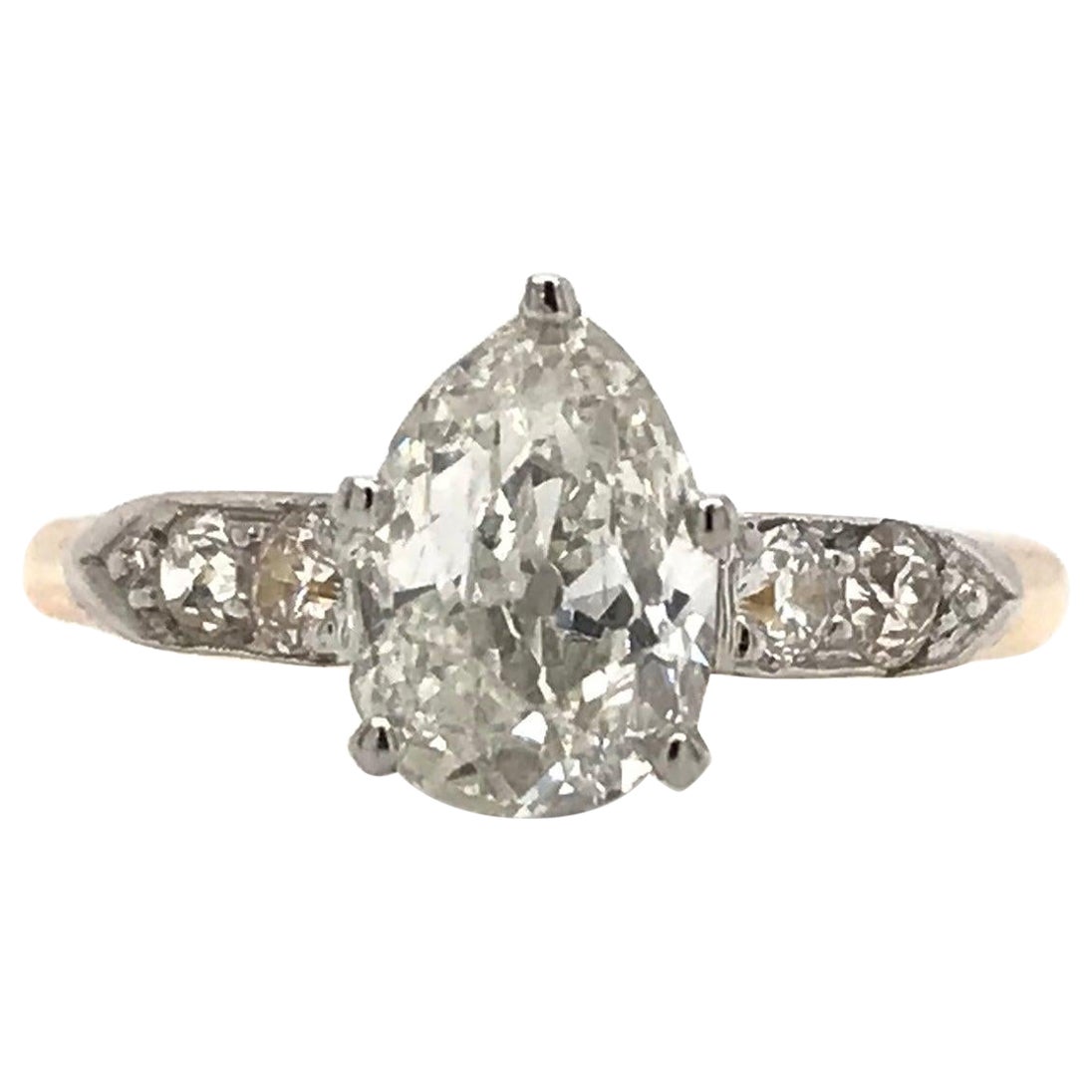 0.95 Carat Pear Cut Diamond Solitaire Style Ring For Sale