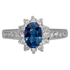 Modern 18 Karat Gold 0.65 Carat Blue Sapphire 0.30 Carat Diamond Cluster Ring