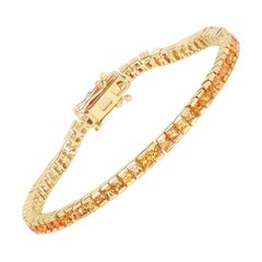 Bracelet tennis en argent plaqué or jaune 14 carats et saphir orange 6,21 carats