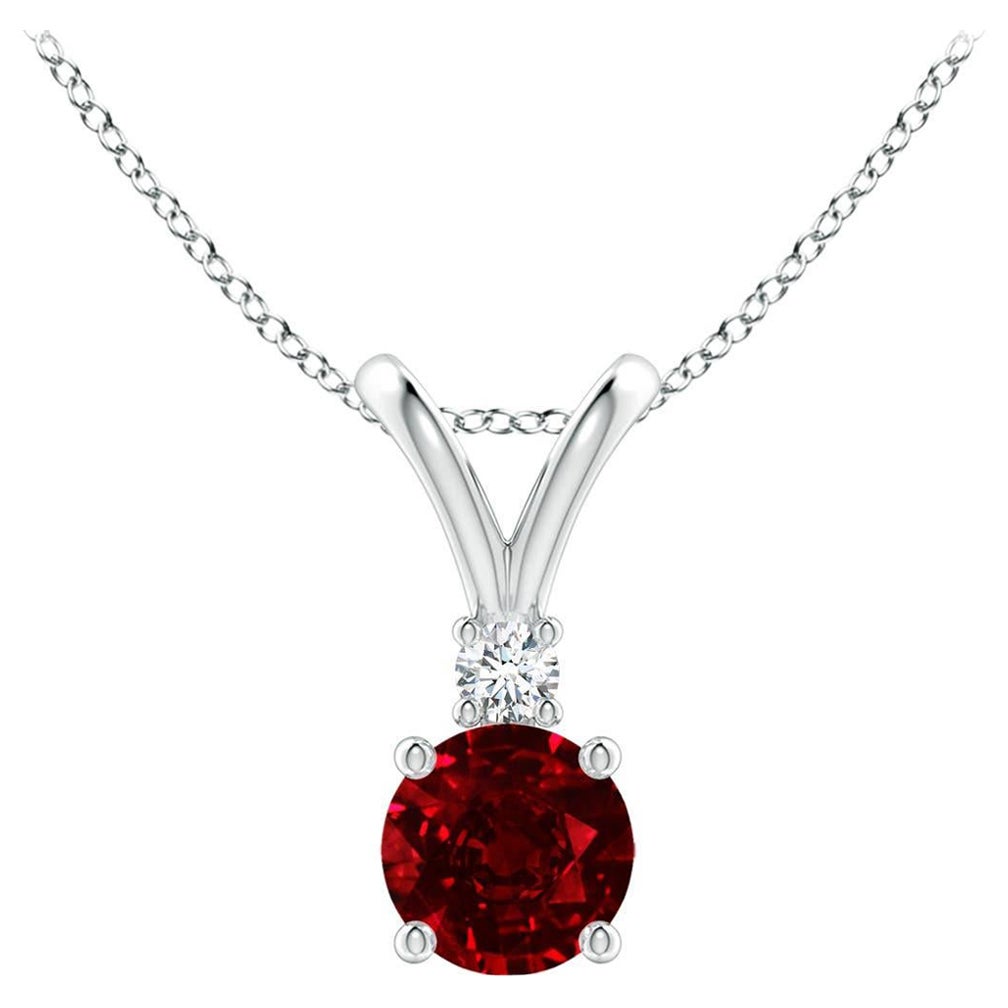 ANGARA Natural Round 0.60ct Ruby Solitaire Pendant with Diamond in Platinum For Sale