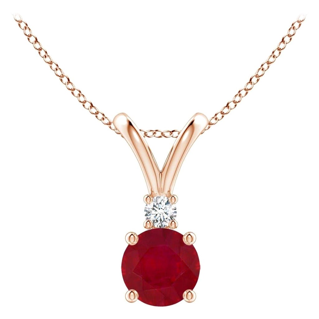 ANGARA Natural Round 0.60ct Ruby Solitaire Diamond Pendant in 14K Rose Gold For Sale