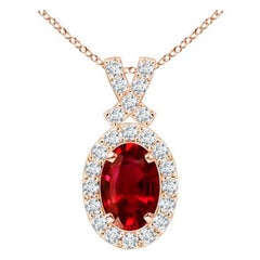 ANGARA Colgante de rubí natural de 0,60 ct con halo de diamantes en oro rosa de 14 quilates