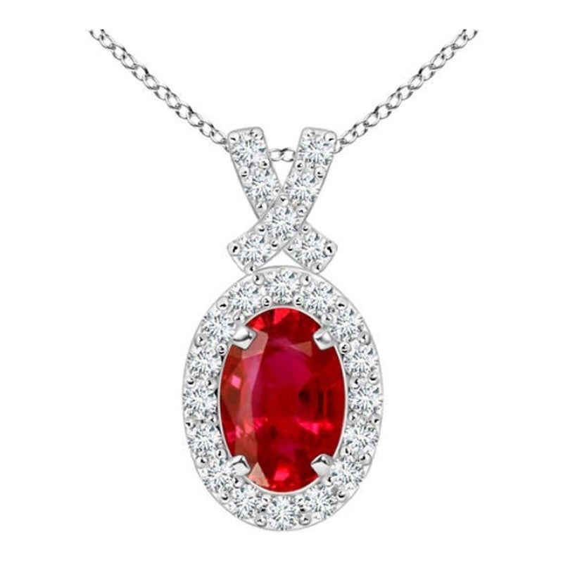 ANGARA Colgante de rubí natural de 0,60 ct con halo de diamantes en oro blanco de 14 quilates en venta