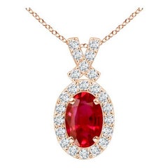 ANGARA Colgante de rubí natural de 0,60 ct con halo de diamantes en oro rosa de 14 quilates
