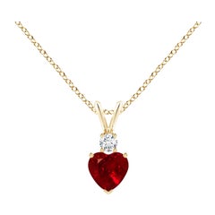 ANGARA Colgante de oreja de conejo con forma de corazón natural de 0,55 ct de rubí en oro amarillo