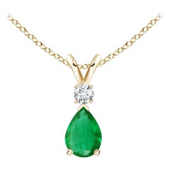 ANGARA Colgante lágrima de esmeralda natural de 0.35 ct con diamante en oro amarillo