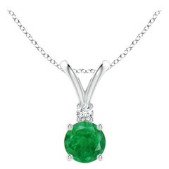 Ciondolo solitario con smeraldo tondo naturale da 0,45ct e diamante in oro bianco 14K