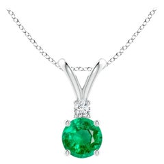 Ciondolo solitario con smeraldo tondo naturale da 0,45ct e diamante in oro bianco 14K