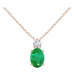 Natural Emerald Solitaire Pendant with Diamond in 14K Rose Gold 7x5mm