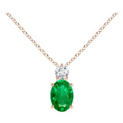 Natural Emerald Solitaire Pendant with Diamond in 14K Rose Gold 7x5mm