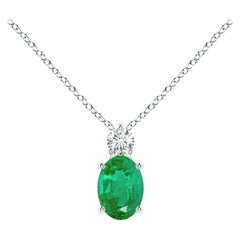 Pendentif solitaire en or blanc 14 carats avec émeraude naturelle et diamant de 7 x 5 mm