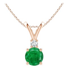 Ciondolo solitario con smeraldo rotondo Nature da 0,75ct e diamante in oro rosa 14K