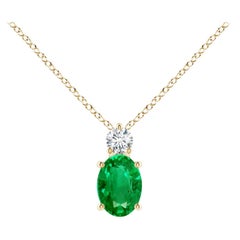 Natural Emerald Solitaire Pendant with Diamond in 14K Yellow Gold 7x5mm