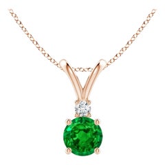 Colgante solitario de esmeralda redonda natural de 0,60 ct con diamante en oro rosa de 14 quilates