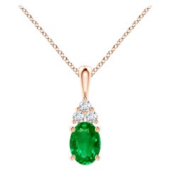 Ciondolo solitario con smeraldo naturale e diamante in oro rosa di dimensioni 7x5 mm