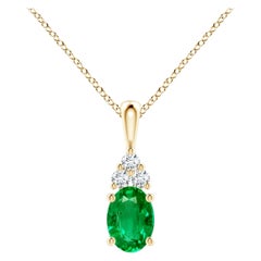 Pendentif solitaire en or jaune avec émeraude naturelle et diamants, taille 7 x 5 mm