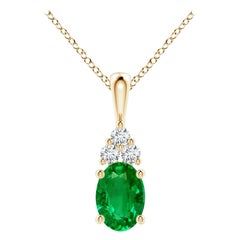 Pendentif solitaire en or jaune avec émeraude naturelle et diamants, taille 7 x 5 mm