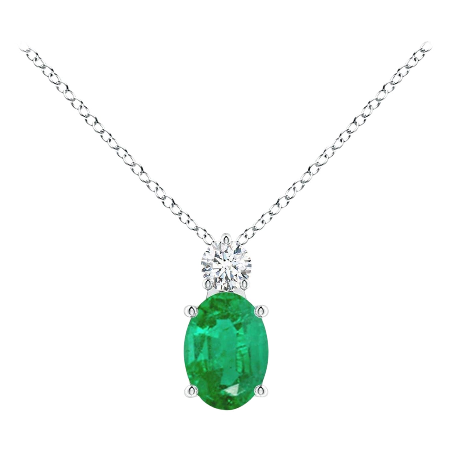 Natural Emerald Solitaire Pendant with Diamond in Platinum Size-7x5mm For Sale