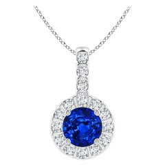 ANGARA Natural 0.60ct Blue Sapphire Pendant with Diamond Halo in Platinum