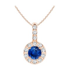 ANGARA Colgante de zafiro azul natural de 0,33 ct con halo de diamantes en oro rosa de 14 quilates