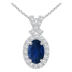ANGARA Natural 0.60ct Blue Sapphire Pendant with Diamond Halo in Platinum