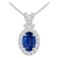 ANGARA Natural 0.60ct Blue Sapphire Pendant with Diamond Halo in Platinum