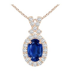 ANGARA Natural 0.60ct Blue Sapphire Pendant with Diamond Halo in 14K Rose Gold